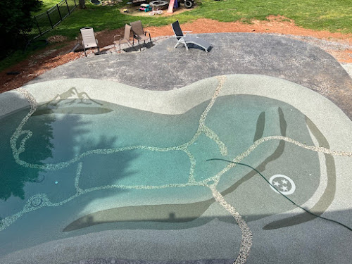 Sand sculpted pool from above, sculpted contours and shallow shelf