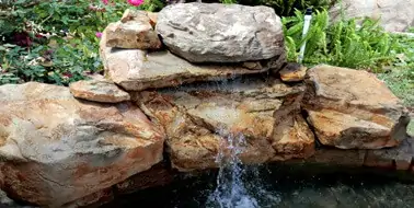Ridge Ledger cast rock feature installed on a pool