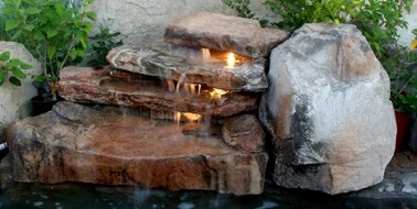 Quick Step Three cast rock feature installed on a pool