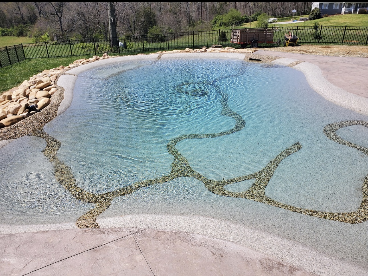 Sand sculpted pool by Blue Lagoon