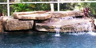 Grand Ledger cast rock feature installed on a pool