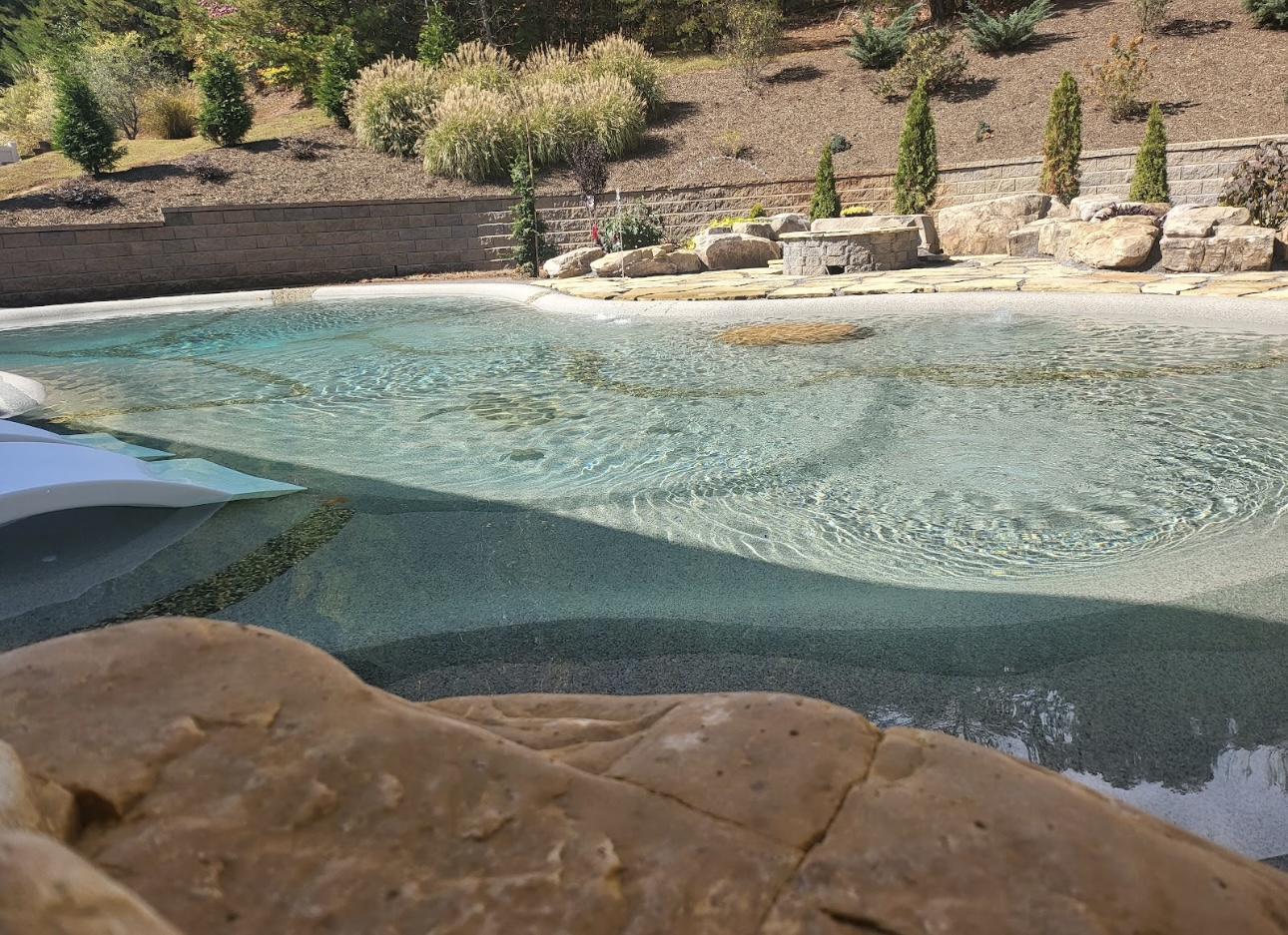 Sand sculpted pool by Blue Lagoon