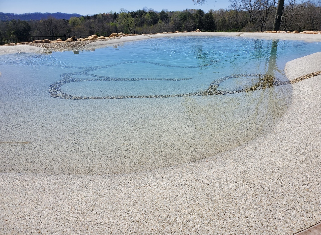 Sand sculpted pool by Blue Lagoon