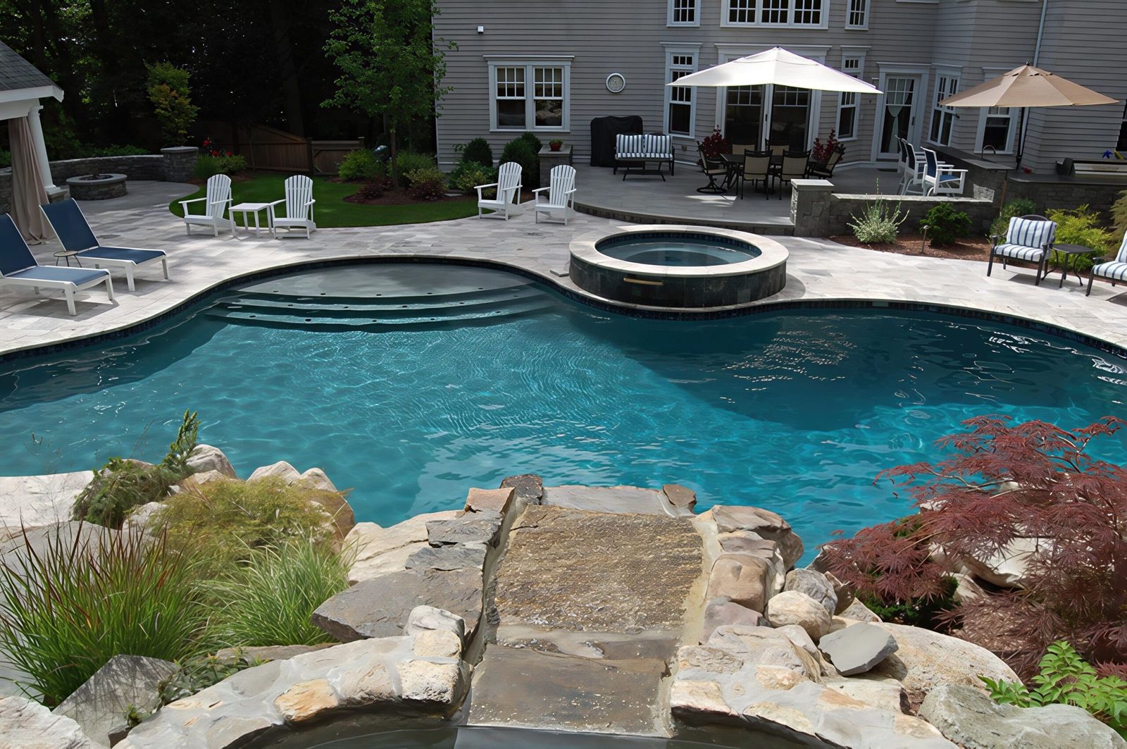 Freeform with rock spa spillover
