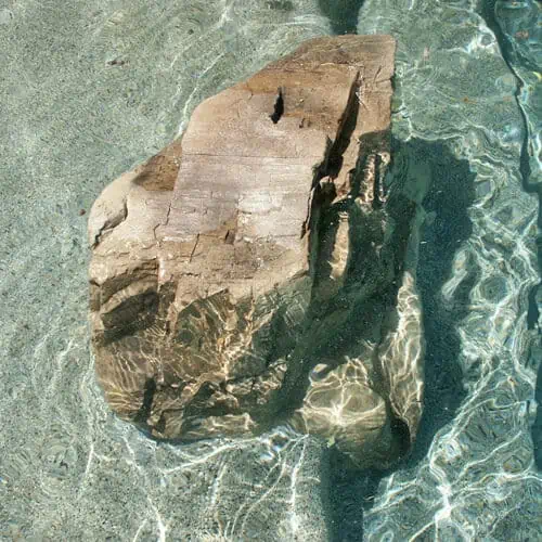 Beach Steppers cast rock feature installed on a pool