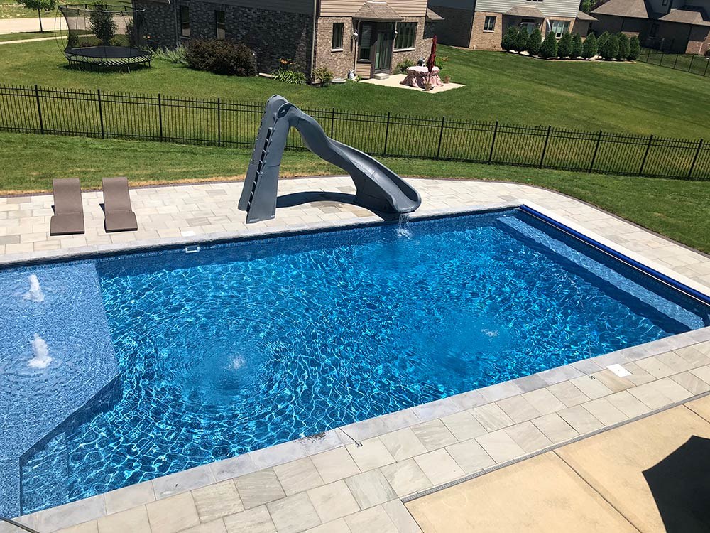 Lagoon Corner Bench installed in a vinyl liner pool